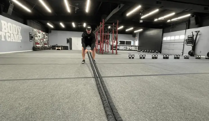 CJ Wehrkamp lines up battle ropes at Sioux Falls Fit Body Boot Camp